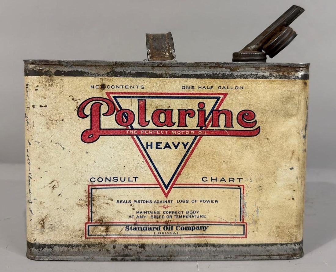 Polarine Motor Oil Half-Gallon Metal Can: rated 7, the half-gallon flat metal can, has wear, soiling and scratches.