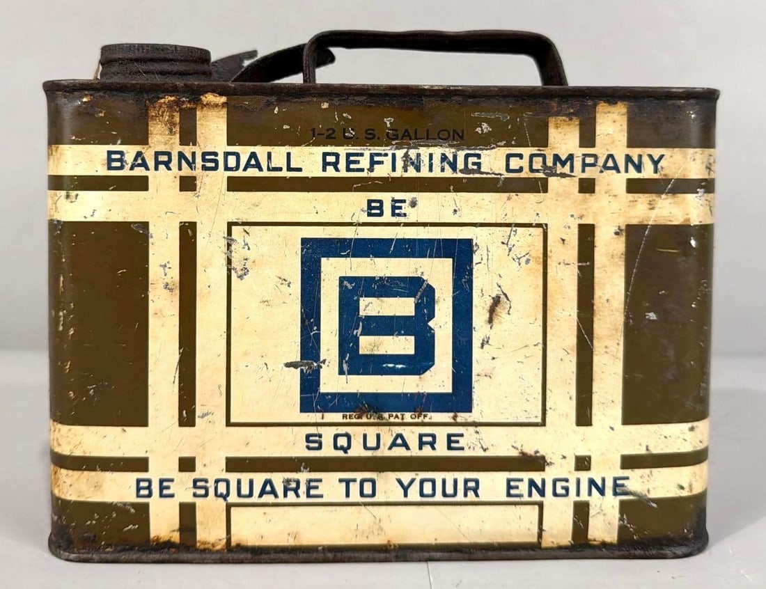 Barnsdall Motor Oil Half Gallon Metal Can: rated 7 & 6, the half-gallon flat metal can, is empty, has wear and scratches.