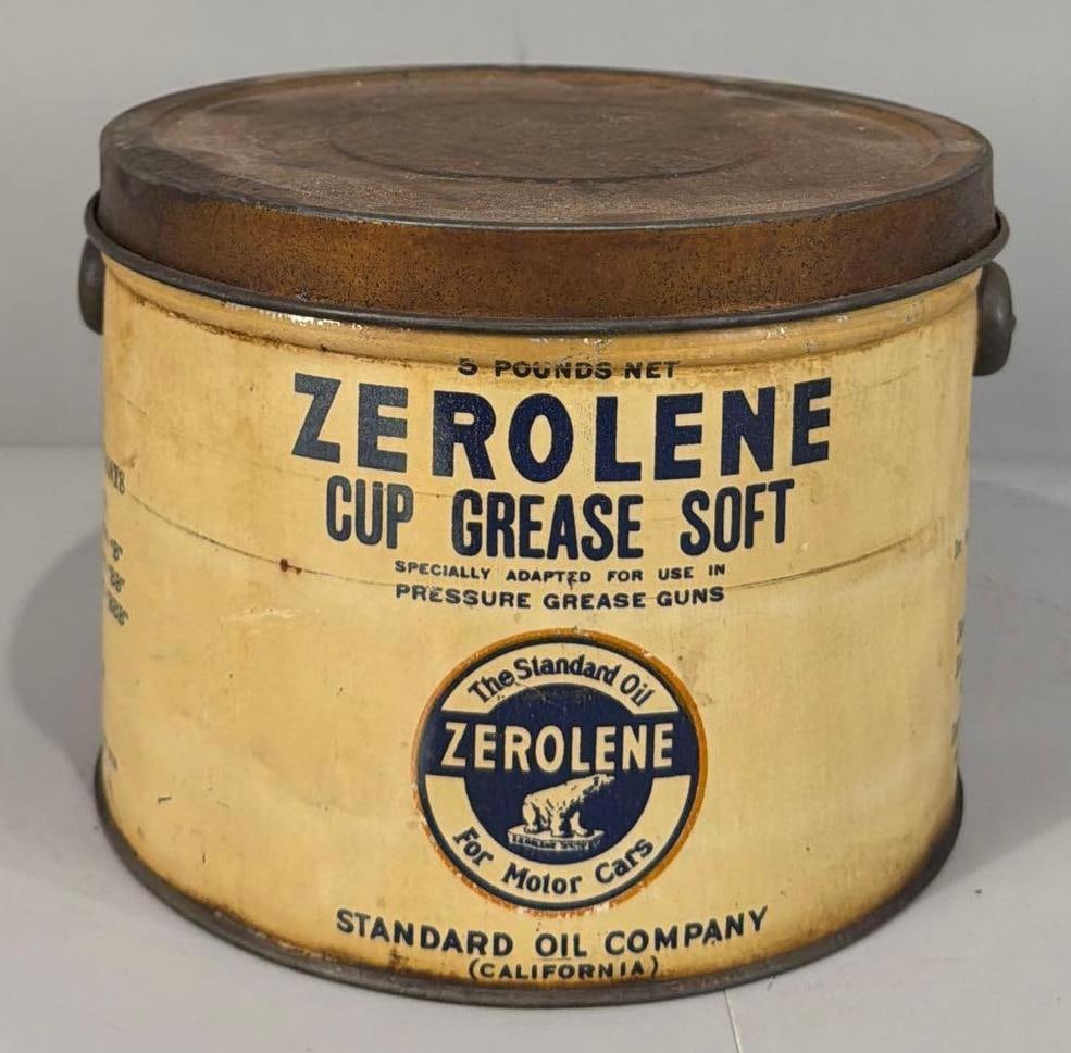 Standard Zerolene Cup Grease Five Pound Metal Can: rated 7.5, the five pound round metal can with bail handle, has light soiling, is empty