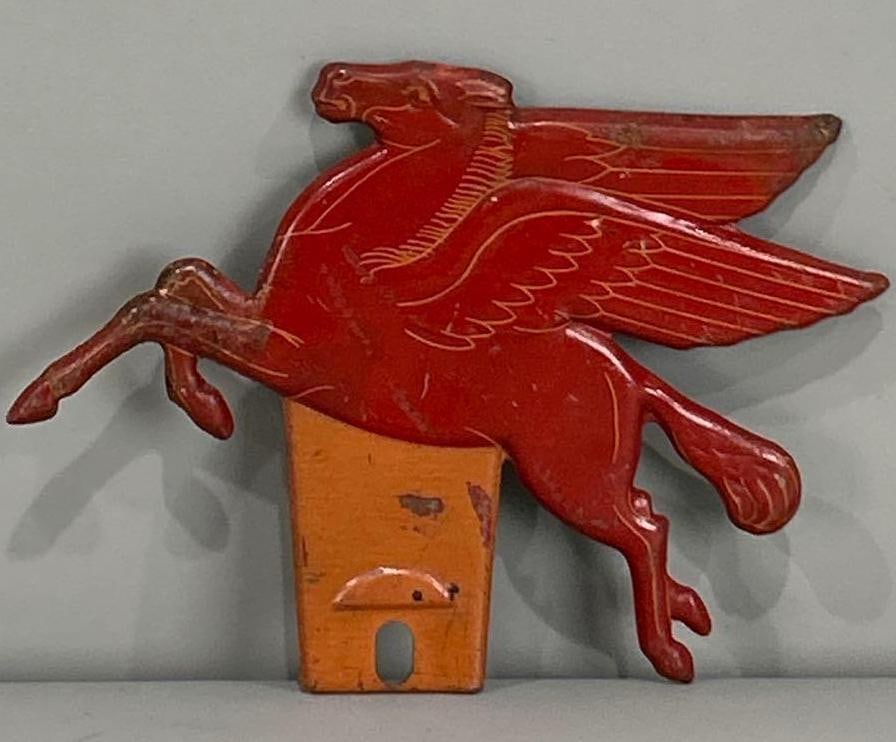 (Mobil) Pegasus Metal License Plate Attachment (1 of 2)