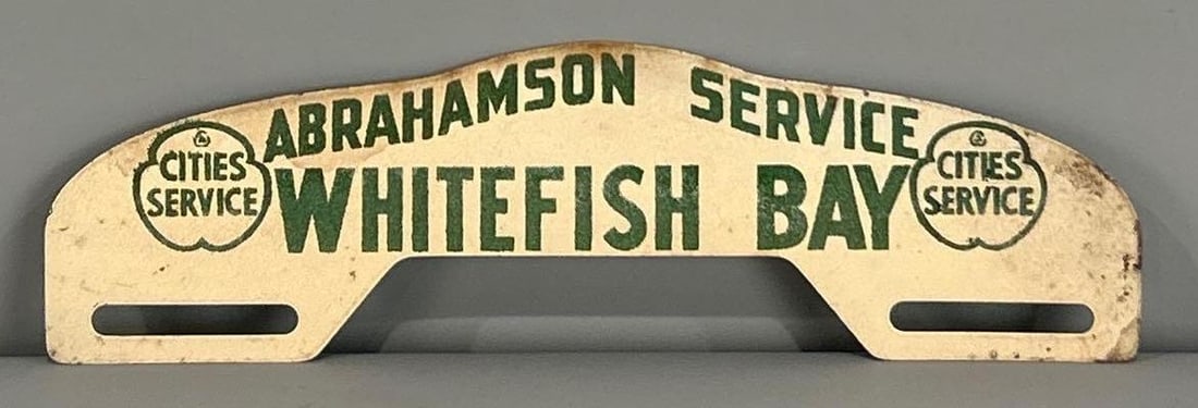 Cities Service Whitefish Bay Metal License Plate Attachment: rated 8.5, 3"x10", has light soiling.