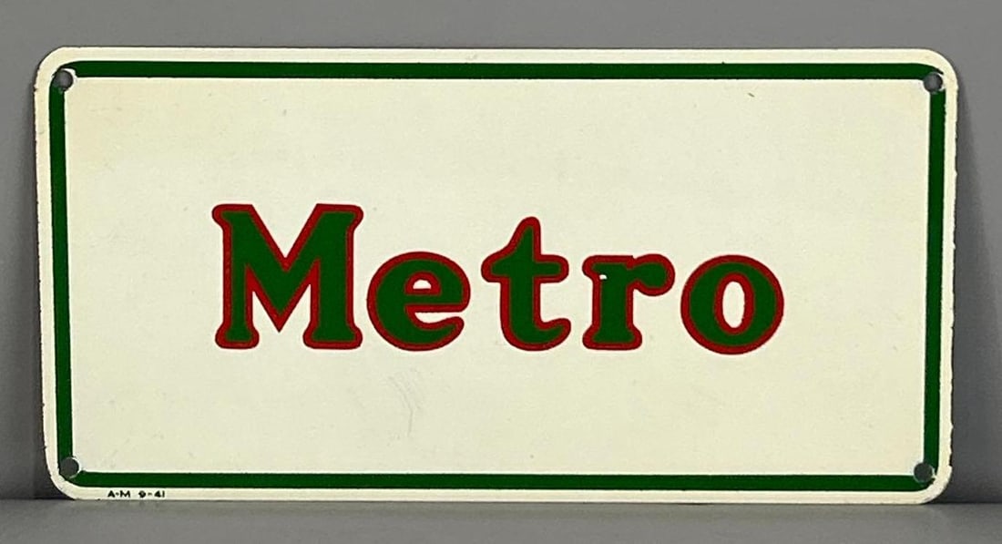 Mobil Metro Tin SIgn: Rated 9.5. 5.25" x 10.25". This SST sign has perfect color and gloss with only one area of light surface scratching under the letter "E". Marked, "A-M 9-41". Rarity 2. TAC #. 061984.