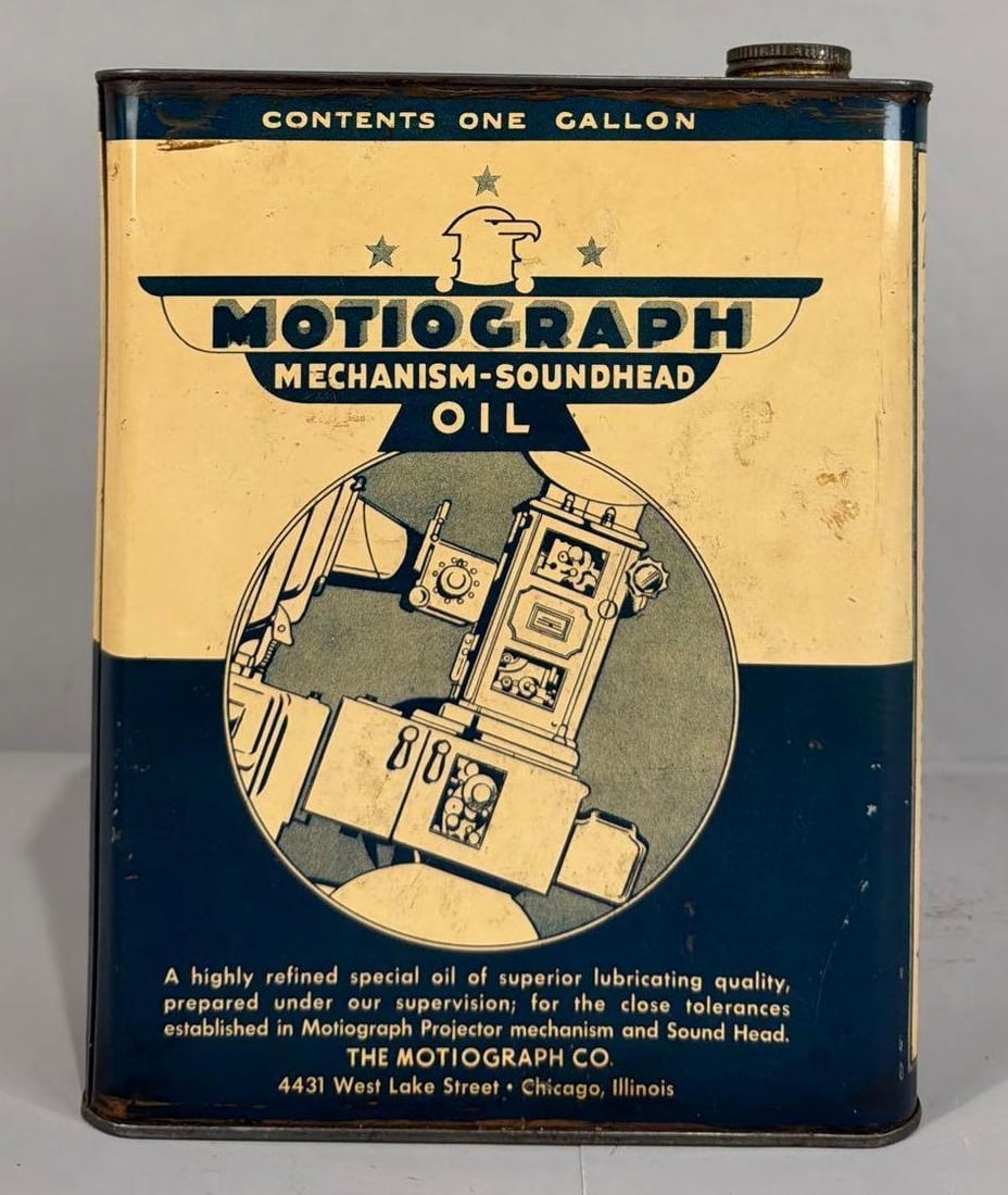 Motiograph Soundhead Oil One Gallon Metal Can: rated 8, the one gallon flat metal can, is emtpy, has light soiling.
