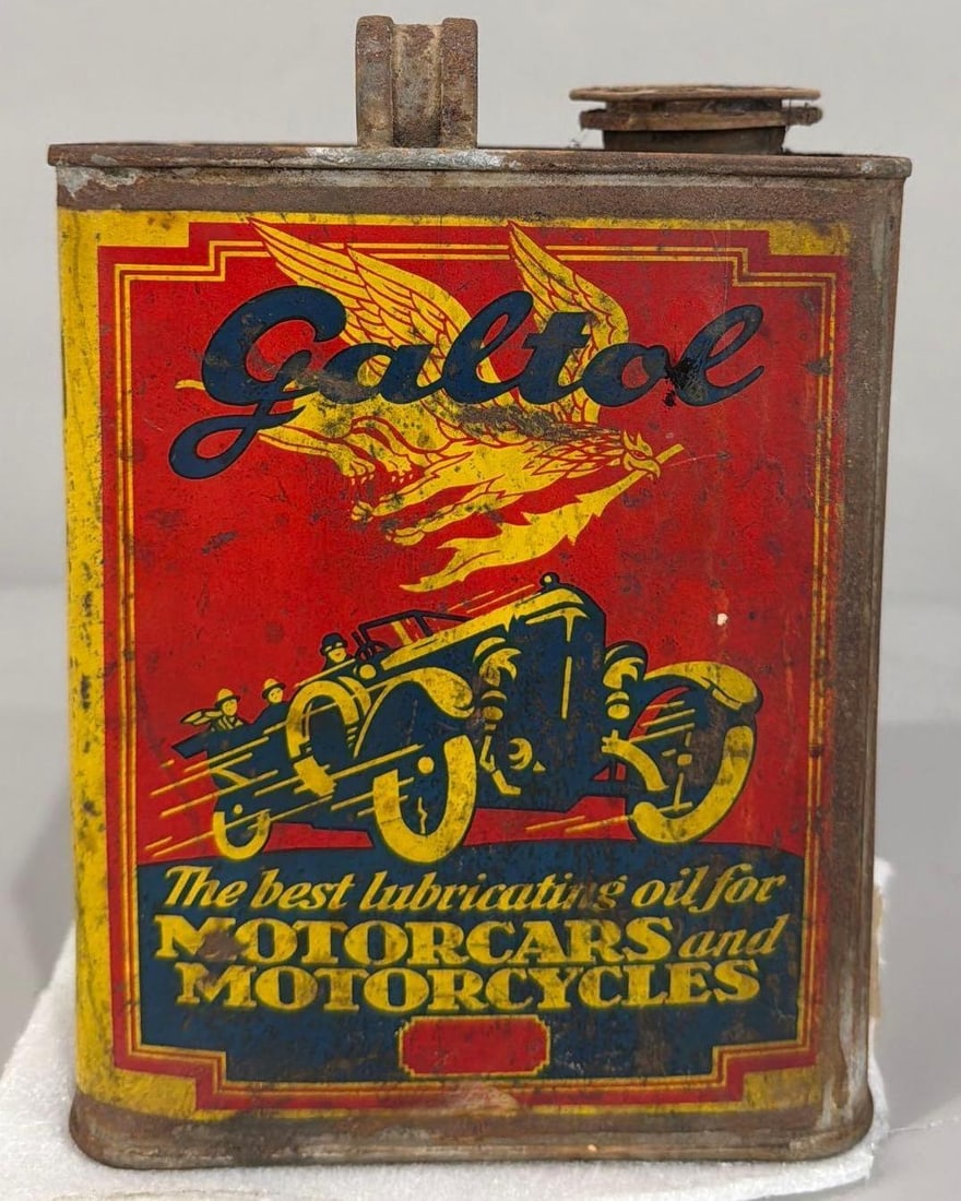 Galtol Oil Motorcar & Motorcycle Metal Can: rated 6.5, the half-gallon? metal can, is empty, has wear and staining, is leaking.