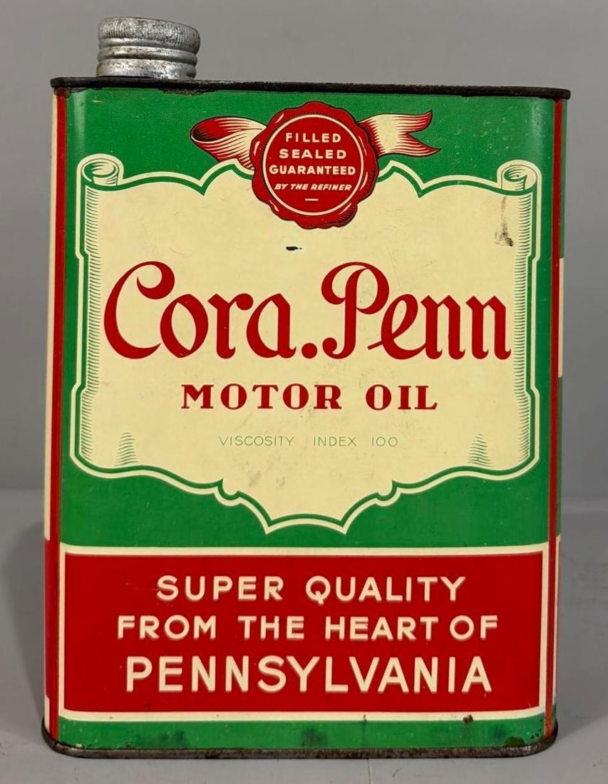 Cora Penn Motor Oil One Liter Metal Can: rated 8.5 & 8, the one liter metal can, is empty, light wear, reverse has more wear.