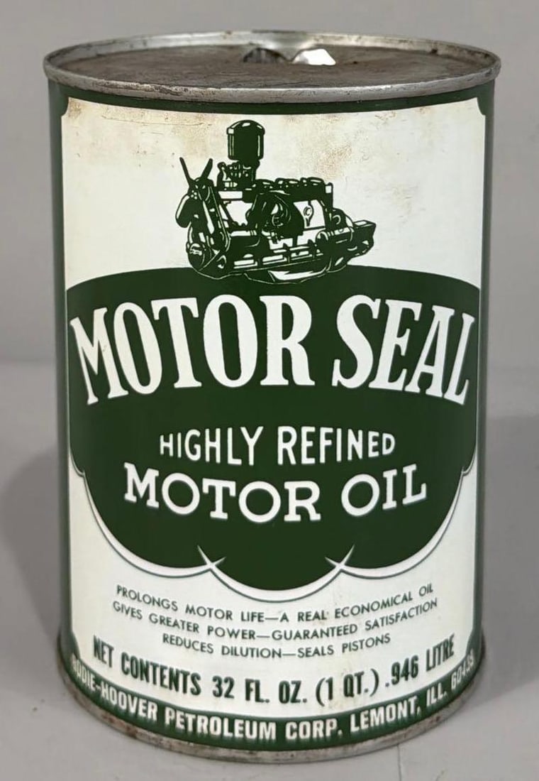 Motor Seal Motor Oil w/Image Round Quart Metal Can: rated 9.5, the one quart round metal can, with crimped seam, is empty, nice.