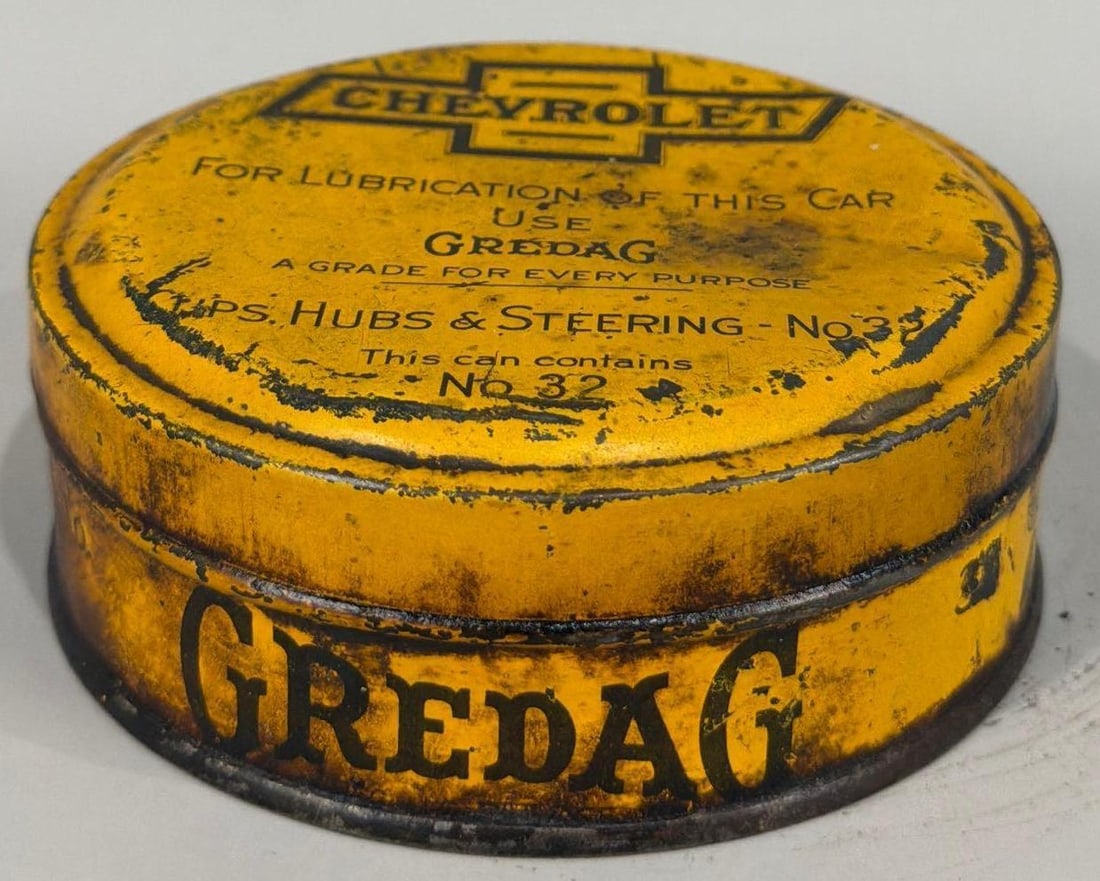 Chevrolet Bowtie Logo Gredag Grease Can: rated 7.5, 4"D., has wear and fine scratches.