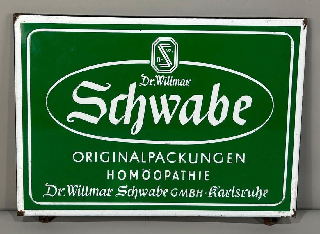 Dr. Willmar Schwabe Porcelain Sign (TAC): rated 9, 12"x17", the SSP rolled edge sign has good color and gloss. TAC #062948