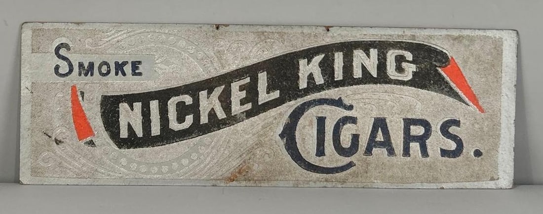 Smoke Nickel King Cigar Cardboard Sign: rated 7.5, 6"x18", the single-sided cardboard sign has wear and minor soiling.