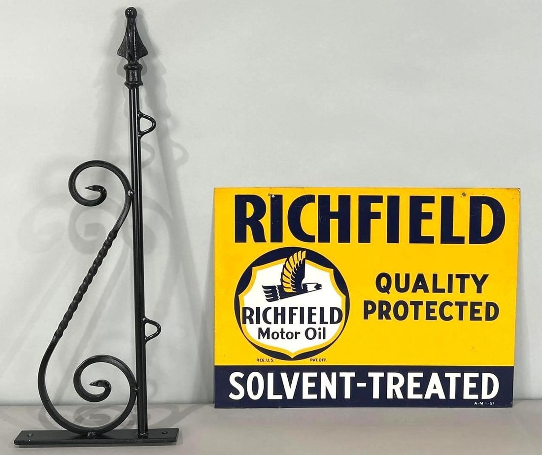 Richfield Solvent Treated Metal Sign W/ Hanging Bracket: Rated 8.9, 8.5. 12" x 16". This DST sign has great color and gloss throughout. Display shows areas of surface scratching, as well as, paint loss on the hanging holes. Reverse side shows slightly more