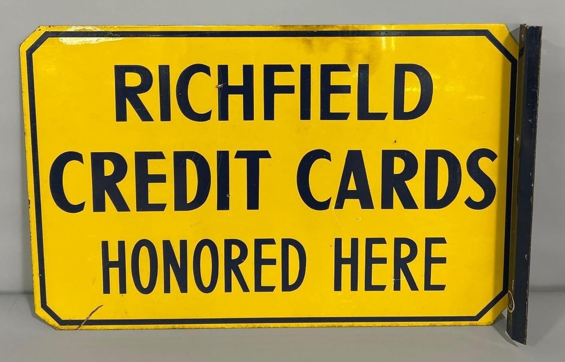 Richfield Credit Cards Honored Here Metal Flange Sign (TAC): rated 8.5, 14"x22", the metal flange sign has good color and shine with light wear and a few fine scratches. Rarity 4. TAC #061338