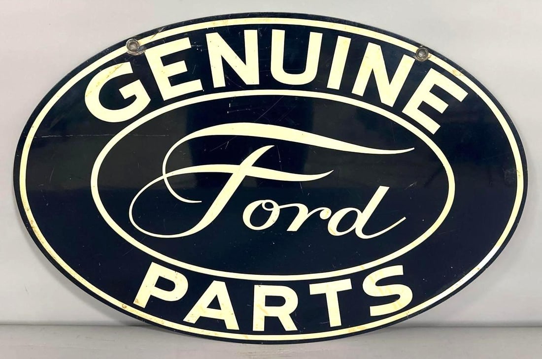 Ford Genuine Parts w/Fancy "Truck" Script Metal Sign (TAC): rated 8.25, 16"x24", the DST oval sign has very good color and shine with wear and fine scratches on both sides. Rarity 7. TAC #032305