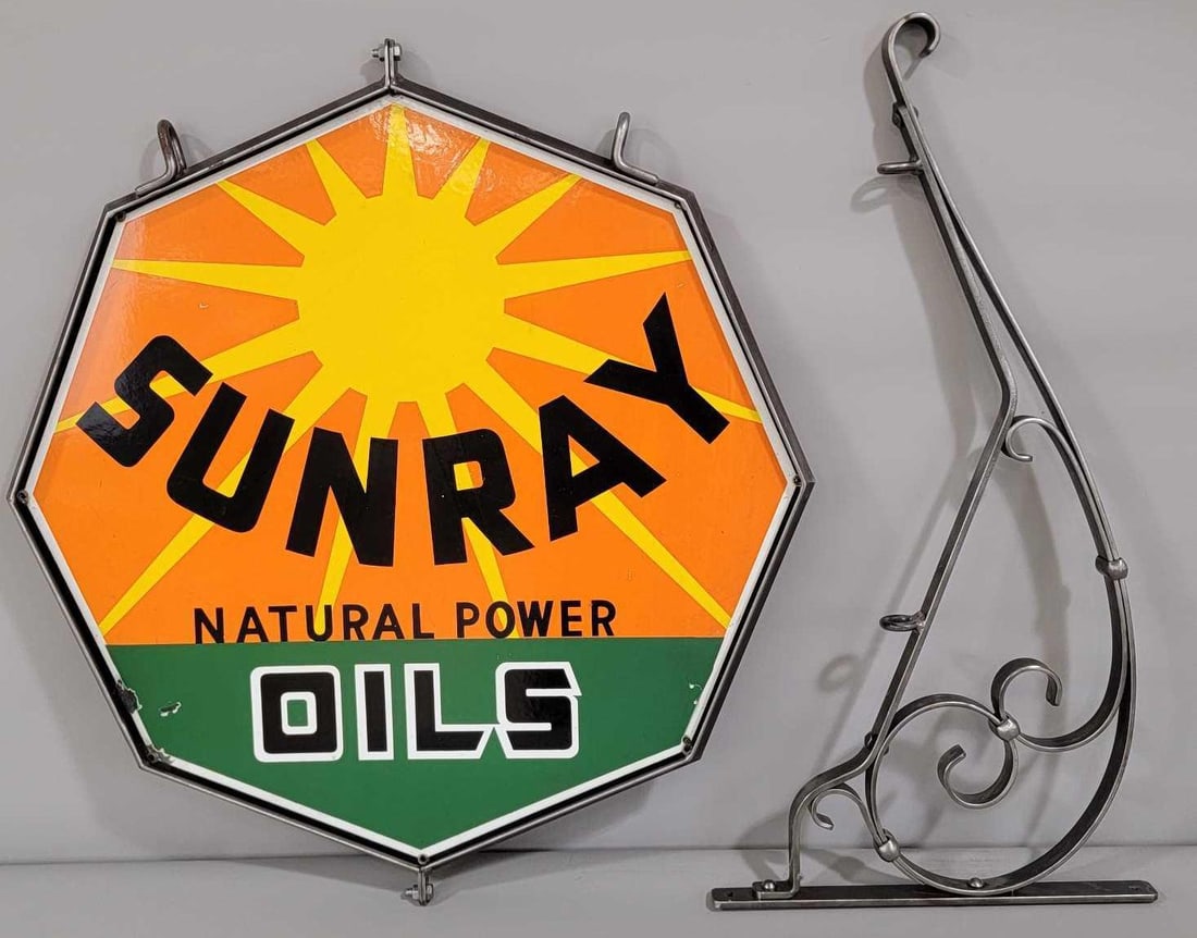 Sunray Natural Power Oils w/Logo Porcelain Sign (TAC): rated 9c & 8.5., 27"x27". The DSP die-cut sign has very good color and gloss. Display shows light wear, chips in outer field and along the perimeter. Reverse has more wear. Comes with bracket and hang