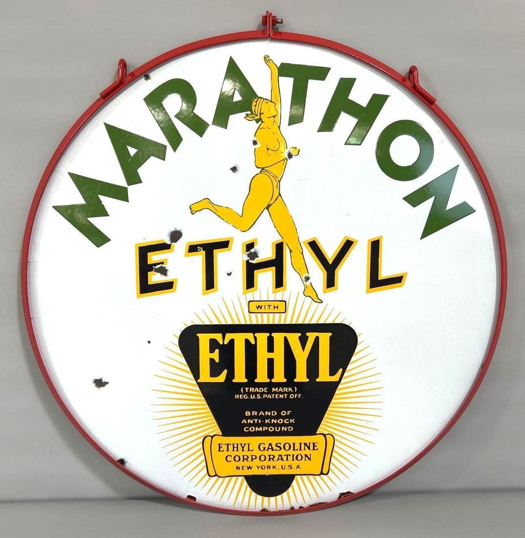 Marathon Ethyl w/Running Man Logo Porcelain Sign (30) (TAC): rated 8.5, 30"D. This DSP sign has very good color and gloss. Display has a few chips in the field, and the reverse side shows slightly more. Mounted in a a Metal Ring. Rarity 6. TAC #043971