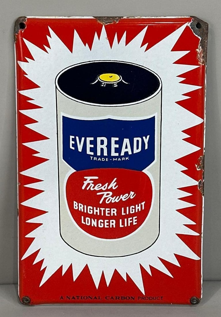 Eveready Batteries Porcelain Sign W/ Battery Graphic: Rated 8.9. 8.5" x 13.75". This SSP sign has excellent color and gloss with notable porcelain loss along the outer perimeter. Marked, "SUR ENAMEL". Rarity 4. TAC # 062192
