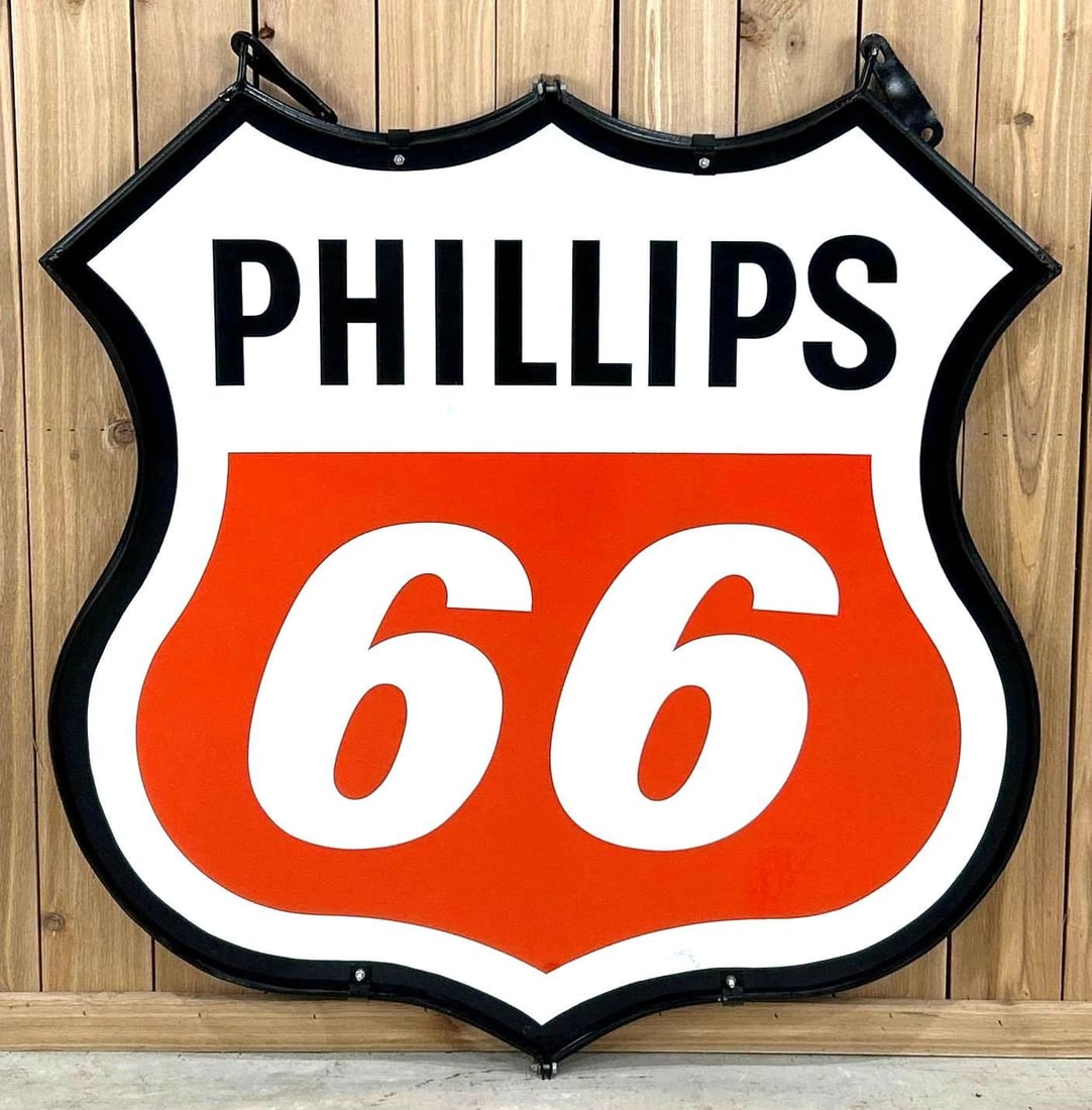 48" Phillips 66 Die-Cut Porcelain Sign W/ Original Hanging Ring: Rated 8.5, 8.9. 48" x 48". This DSP die-cut sign has excellent color and gloss throughout both sides. Sign has small areas of touch up in the field on both sides, as well as other minor areas on outer