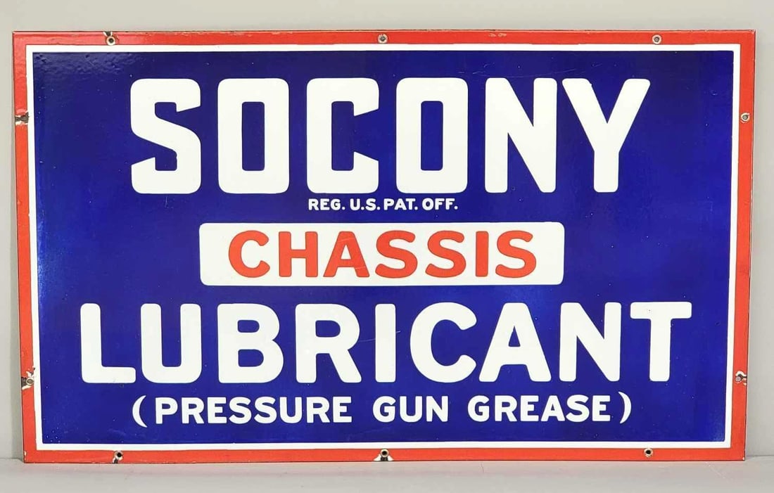 Socony Chassis Lubricant Porcelain Sign (TAC): rated 9, 18"x30". This SSP sign has excellent color and gloss with a fine scratch in the field. Sign has tiny chips around the perimeter. Rarity 4. TAC #061673