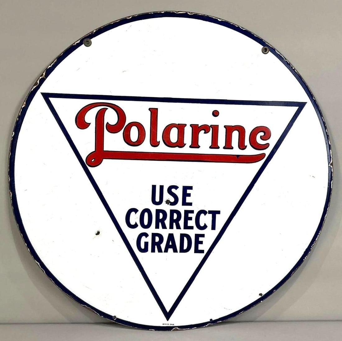 Polarine "Use Correct Grade" Double-Sided porcelain Sign: (Rated 8.75, 8.5) 28" dia. This DSP sign shows good color and gloss throughout both sides. Display shows staining and porcelain loss along the outer field and outer edge. Reverse side shows