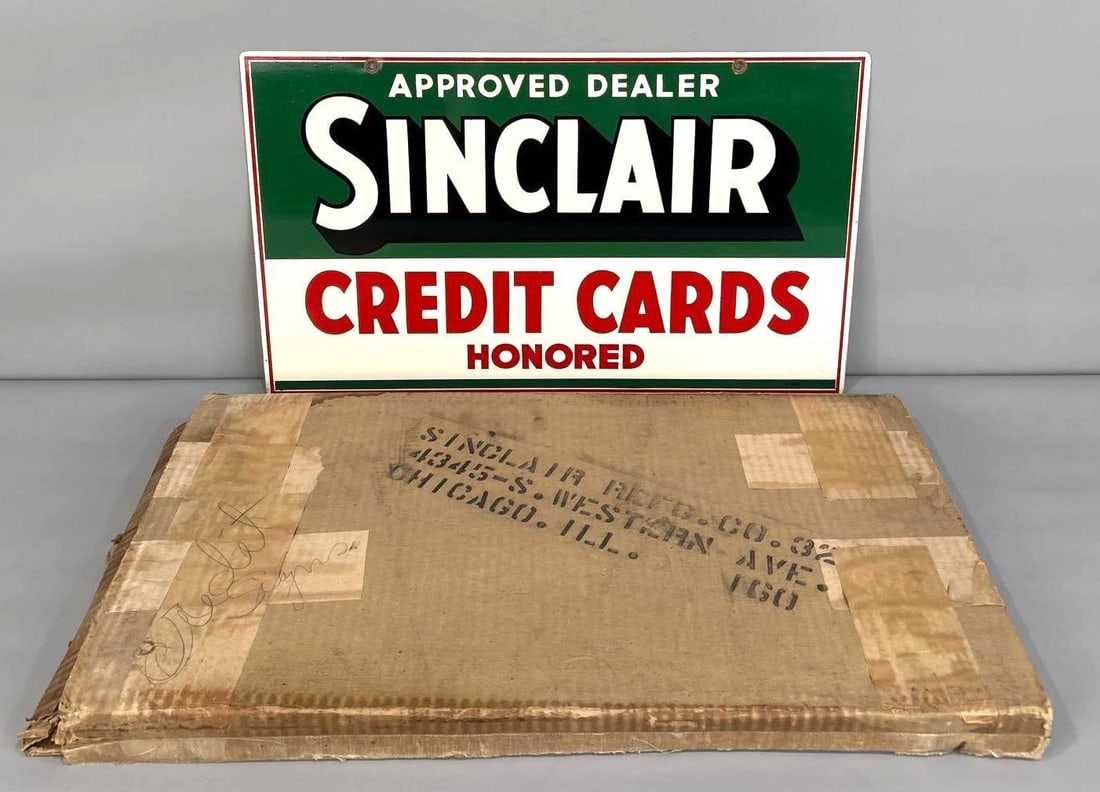 NOS Sinclair Credit Cards Metal Sign W/ Original Box: Rated 9.5, 9.5. 16" x 26" (box). This DST sign boasts exceptional color and gloss throughout both fields. one non-distracting edge wear on the reverse side. Marked, "A 3-41". Rarity 3. TAC # 061925