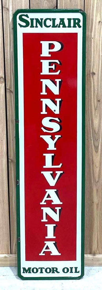 Sinclair Pennsylvania Motor Oil Porcelain Sign (TAC): rated 8.9, 60"x15". This SSP vertical rolled edge sign has good color and gloss with a small chip in the field and around the perimeter. Rarity 4. TAC #061610