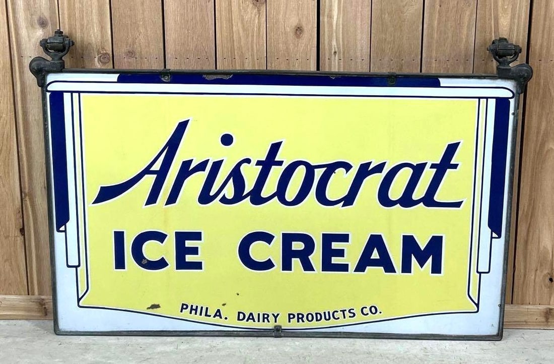 Aristocrat Ice Cream Porcelain Sign (TAC): rated 8.9, 30"x50". This DSP sign has good color and gloss with a few small chips in the field. Rarity 4. TAC #061568