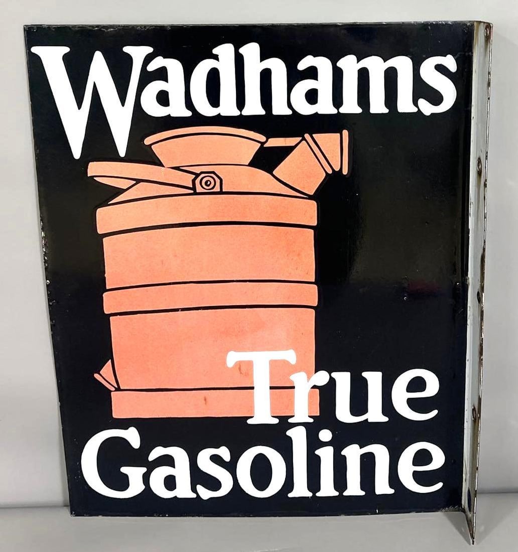 Wadham True Gasoline True Gasoline Porcelain Sign (TAC): rated 8.9 20"x16", the porcelain flange sign has good color and gloss. Red is slightly faded. Sign has small chips on the flange. Rarity 6. TAC #061467