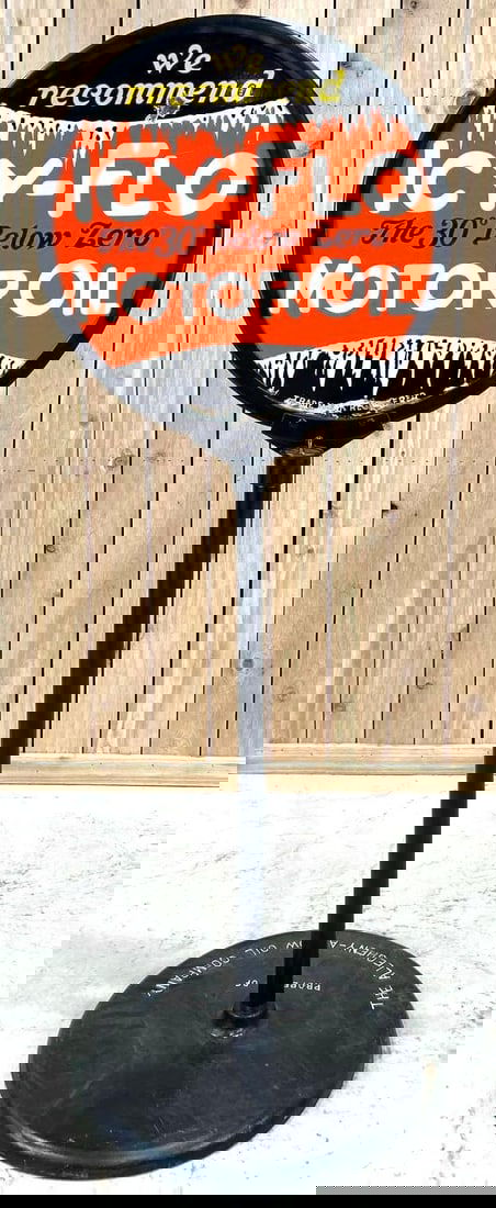 We Recommend Icy-Flo Motor Oil Porcelain Curb Sign W/ Ice Sickle Graphics: Rated 8, 7.9. 23" dia. This DSP has good color and gloss with surface scratching and porcelain loss on both sides. The outer edges of the sign also show porcelain loss. Base and pole have been