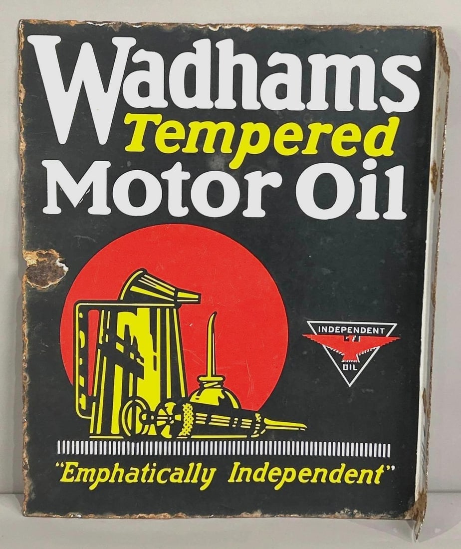 Wadhams Tempered Motor Oil w/ Independent Logo Porcelain Flange Sign: (Rated 7.9, 7.5). 16.5" x 20". This DSP flange sign has fair color throughout. Display side has faded gloss and porcelain loss on the perimeter and outer edge. Reverse shows more oxidation and edge