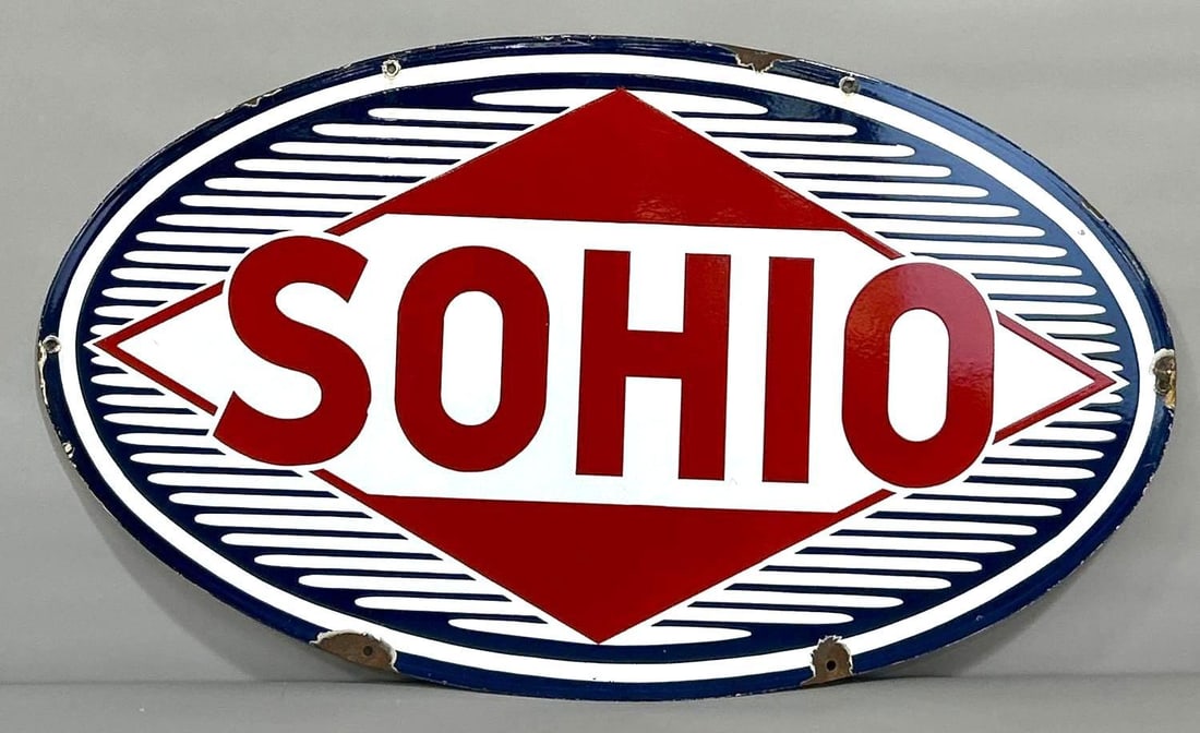 Sohio w/Striped Logo Porcelain Sign (TAC): rated 9, 26"x45", the SSP oval sign has excellent color and gloss with chips at the mounting holes. Rarity 6. TAC #061471