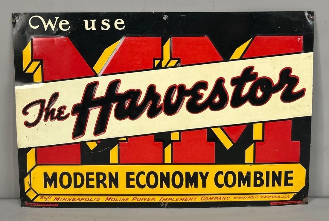 We Use MM Harvest "Modern Economy Combine" Metal Tacker Sign (TAC): rated 8.5, 13.5"x20", the SST tacker sign has good color and shine, light wear and a few fine scratches, marked Billy Newton. Rarity 6. TAC #058069