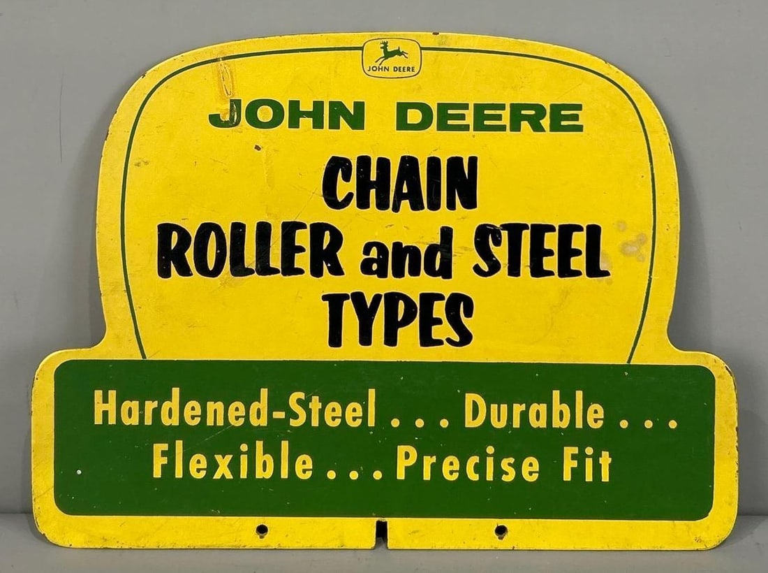 John Deere Chain Roller & Steel Types Masonite Sign (TAC): rated 8.25 & 8. 11"x15", the die-cut Masonite sign has good color and shine, has wear, reverse has more wear. TAC #032383