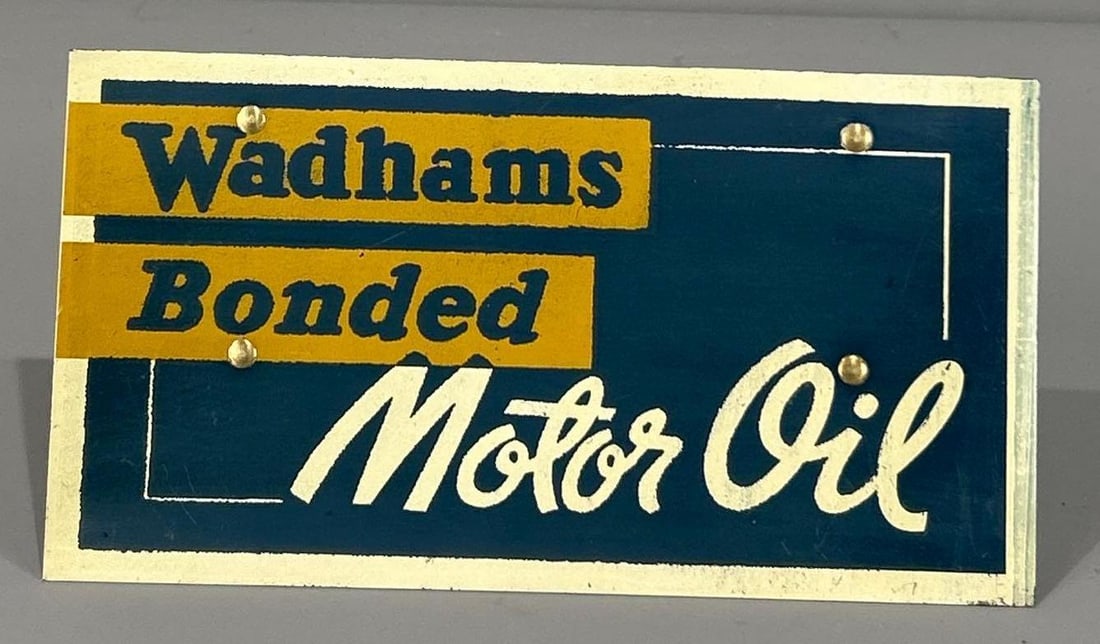 Wadhams Tempered Motor Oil Metal Oil Rack Sign (TAC): rated 9, 4"x7.5", the SST sign has excellent color and shine, nice. Rarity 5. TAC #062981