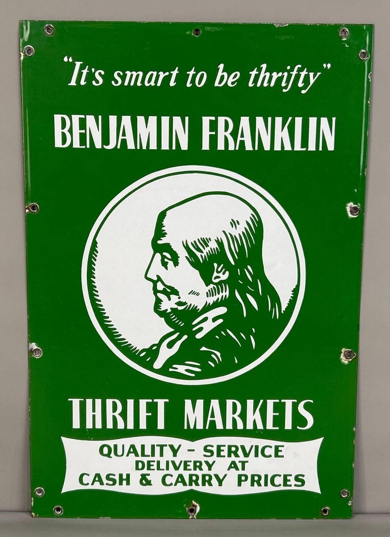 Thrift Markets Single-Sided Porcelain Sign W/ Benjamin Franklin Graphic: (Rated 9.0). 16" x 24". This SSP sign has good color and gloss throughout with minor areas of surface scratching in the field. Outer edge has minor porcelain loss at the hanging holes. Rarity 8. TAC
