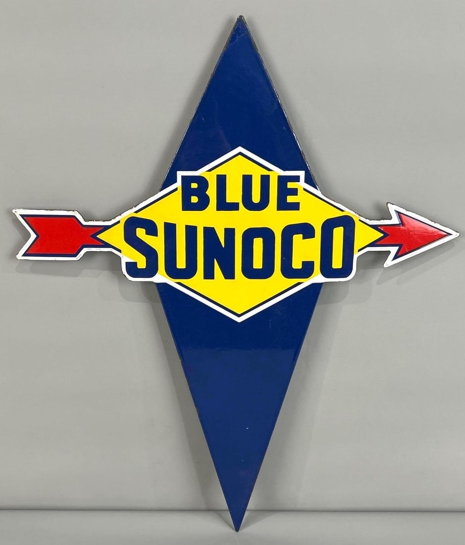 Blue Sunoco Die-Cut Porcelain Pum Plate: (Rated 9.0). 18.5" x 22.5". This SSP sign has excellent color and gloss with notable surface scratching and edge wear. Rarity 2. TAC # 062174. 