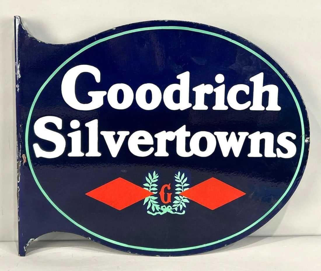 Goodrich Silvertowns w/Logo Porcelain Flange Sign (TAC): rated 9 & 9c, 19"x23", the diecut porcelain flange sign has very good color and gloss, reverse has tiny chip, chips on the flange. Rarity 3. TAC #062931