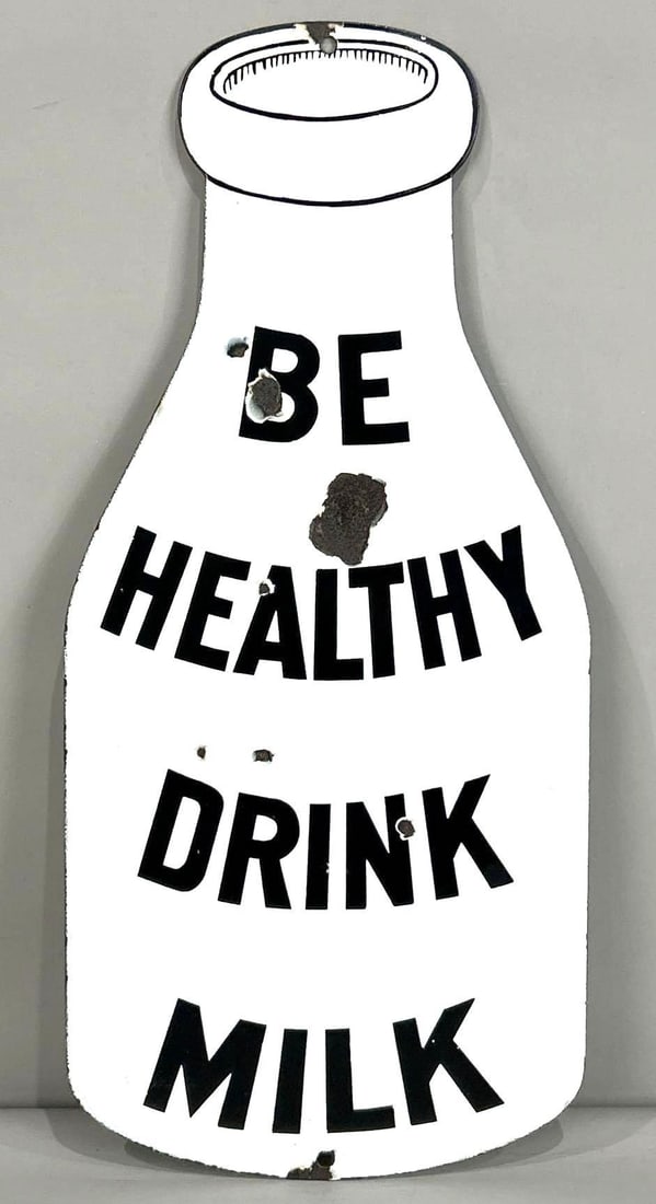 Be Healthy Drink Milk Single-Sided Die-Cut Porcelain Sign: (Rated 8.25). 9" x 20". This SSP sign has strong color and gloss throughout with porcelain loss in the field. Outer edge and hanging holes also show porcelain loss. Rarity 3. TAC # 062271.
