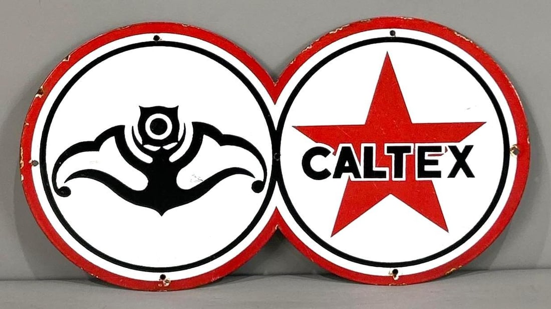 Caltex Star Logo Eight-Ball Porcelain Sign (TAC): rated 8.9, 8"x14.25", the SSP diecut sign has good color and some gloss, light wear in the field and around the perimeter. Rarity 4. TAC #062672