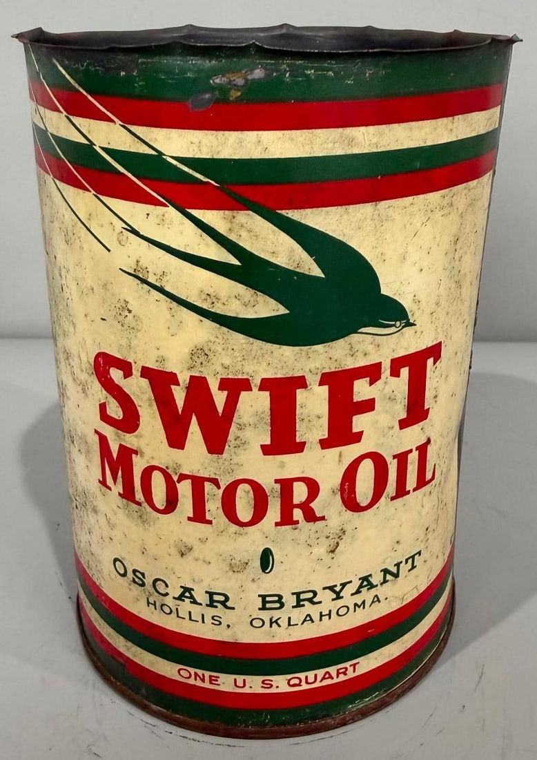 Swift Motor Oil Quart Can: rate 7, the metal quart can shows wear throughout, is missing its top lid