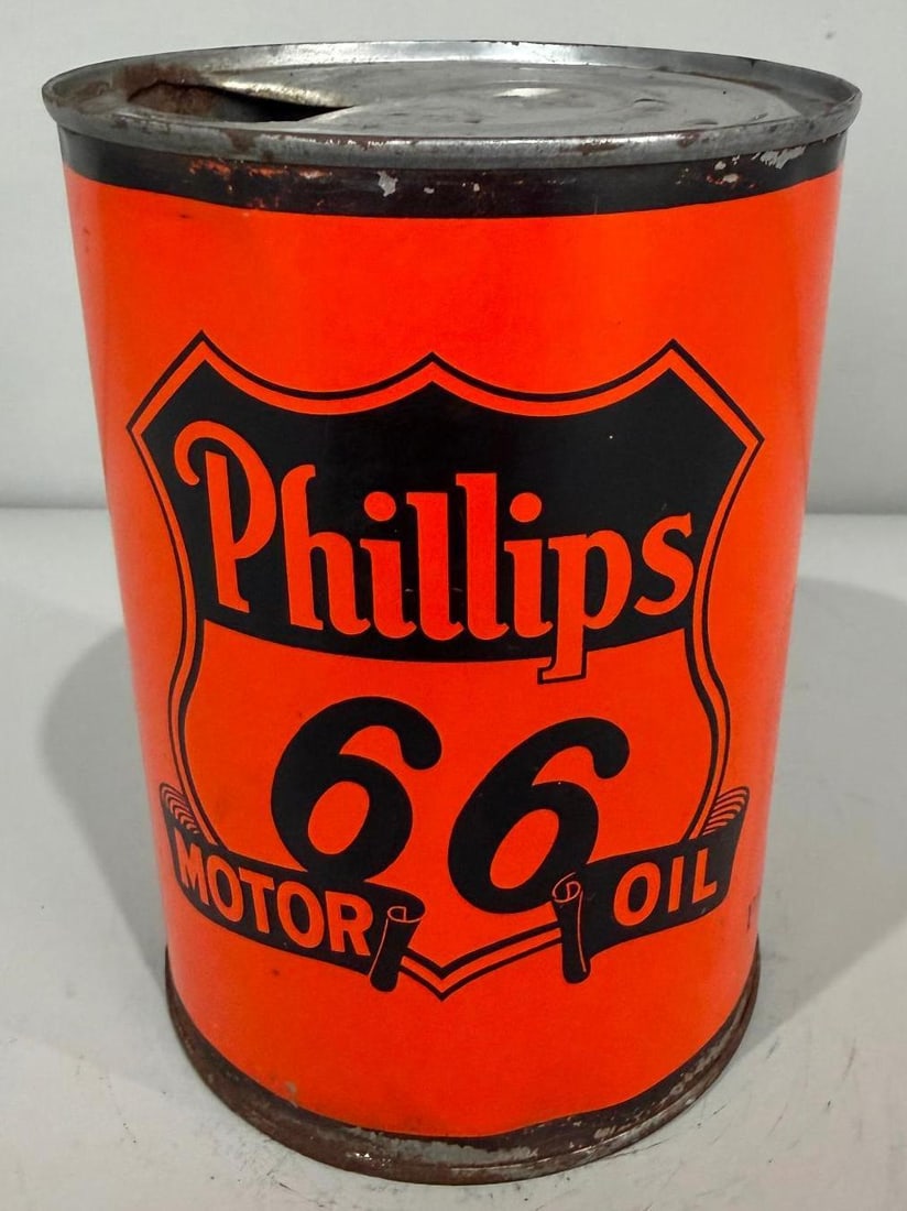 Phillips 66 Motor Oil Metal Quart Can: rate 7.9, the metal can has good color and shine, shows some paint loss along the lid seams 
