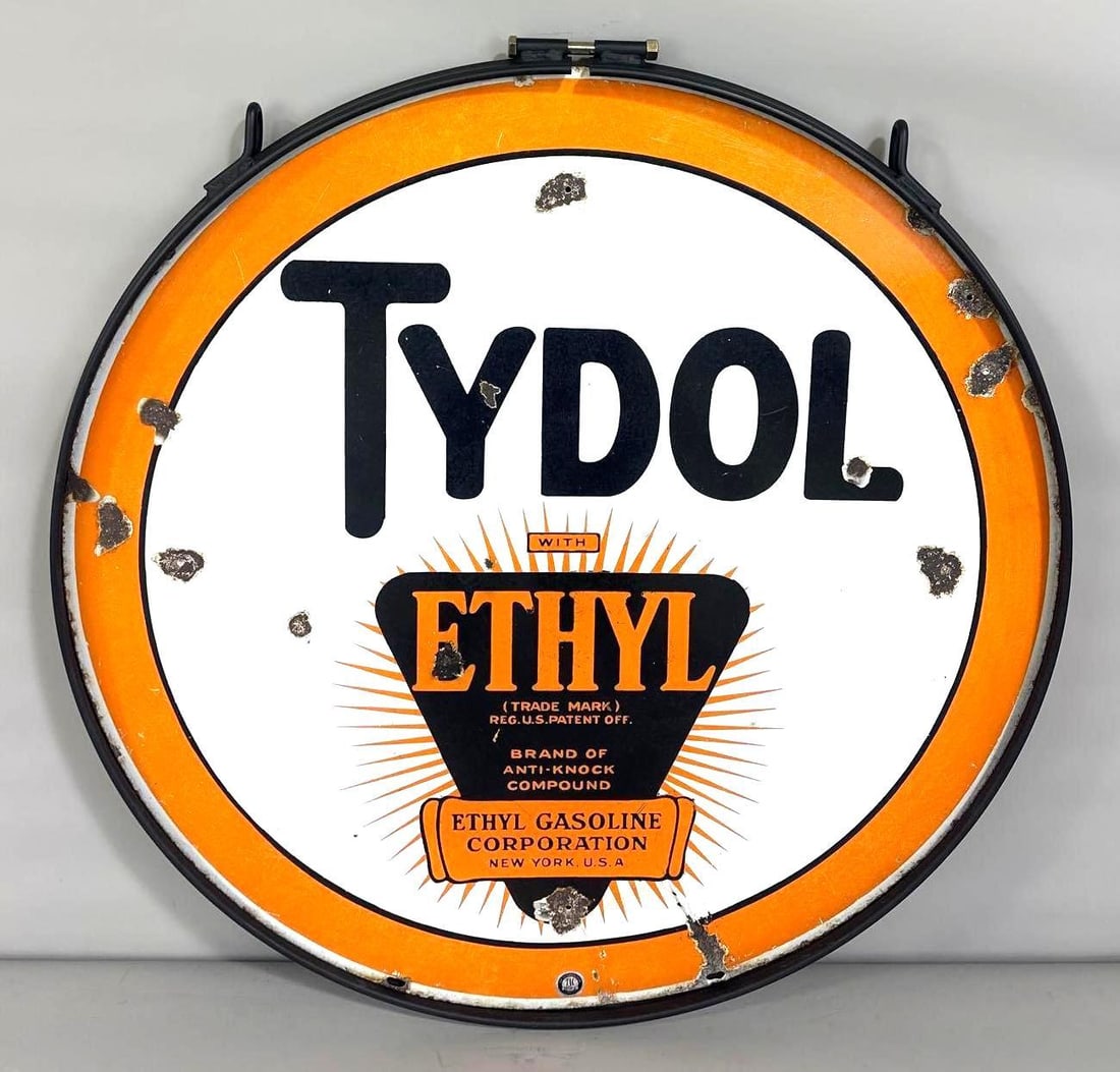 30" Tydol w/Ethyl Logo Porcealin Sign (TAC): rated 7.75, 30"D., the DSP sign has good color and some gloss with chips and wear. Sign has extra hole in lower field. Rarity 4. TAC #061419