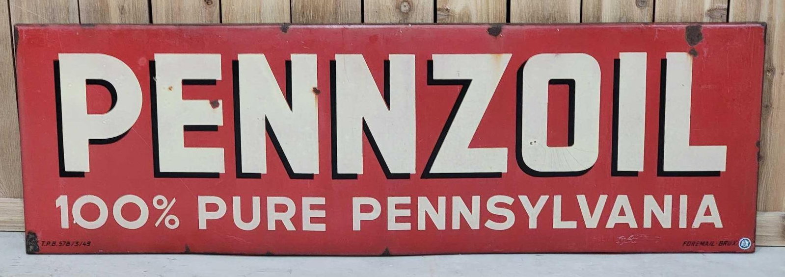 Pennzoil "100% Pure Pennsylvania" Porcelain Sign (TAC): rated 7, 18.5"x58", the SSP rolled edge sign has soiling, wear and crazing, marked Foremail Brux. Rarity 3. TAC #063232