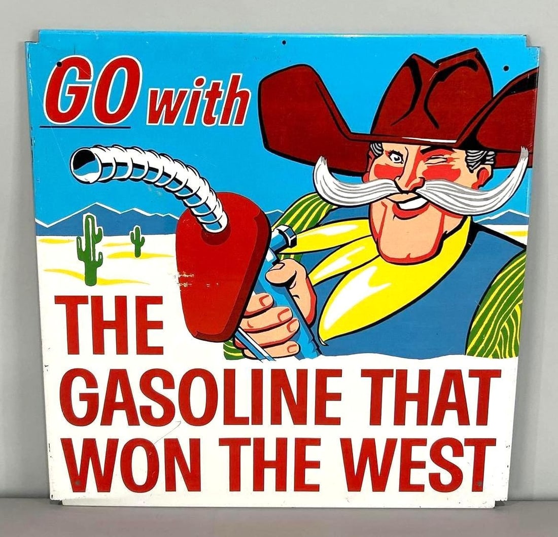 The gasoline That Won The West Rack Topper W/ Cowboy Graphic: Rated 8.9. 15.5" x 16". This SST sign has excellent color and gloss throughout. Sign shows minor scratches and surface abrasions with paint loss in the field and on the outer edge. Rarity 3. TAC #0618