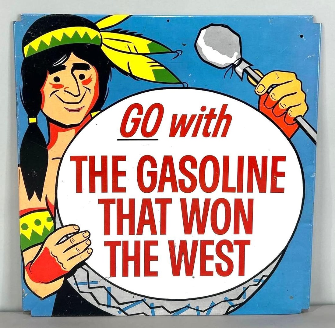 Go With The Gasoline That Won The West Rack Topper W/ Native American Graphic: Rated 8.9. 15.5" x 16". This SST sign has strong color and gloss throughout. Sign shows minor surface abrasions and scratches with paint loss in the field and on the perimeter. Rarity 4. TAC #061826.