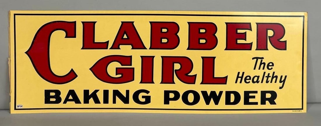 NOS Clabber Girl Double-Sided Tin Tacker Sign: (Rated 9.25). 12" x 34". This DST sign shows good color and shine throughout, with minor surface scratches and rice paper residue visible in the lettering. Reverse side still has rice paper attached.&