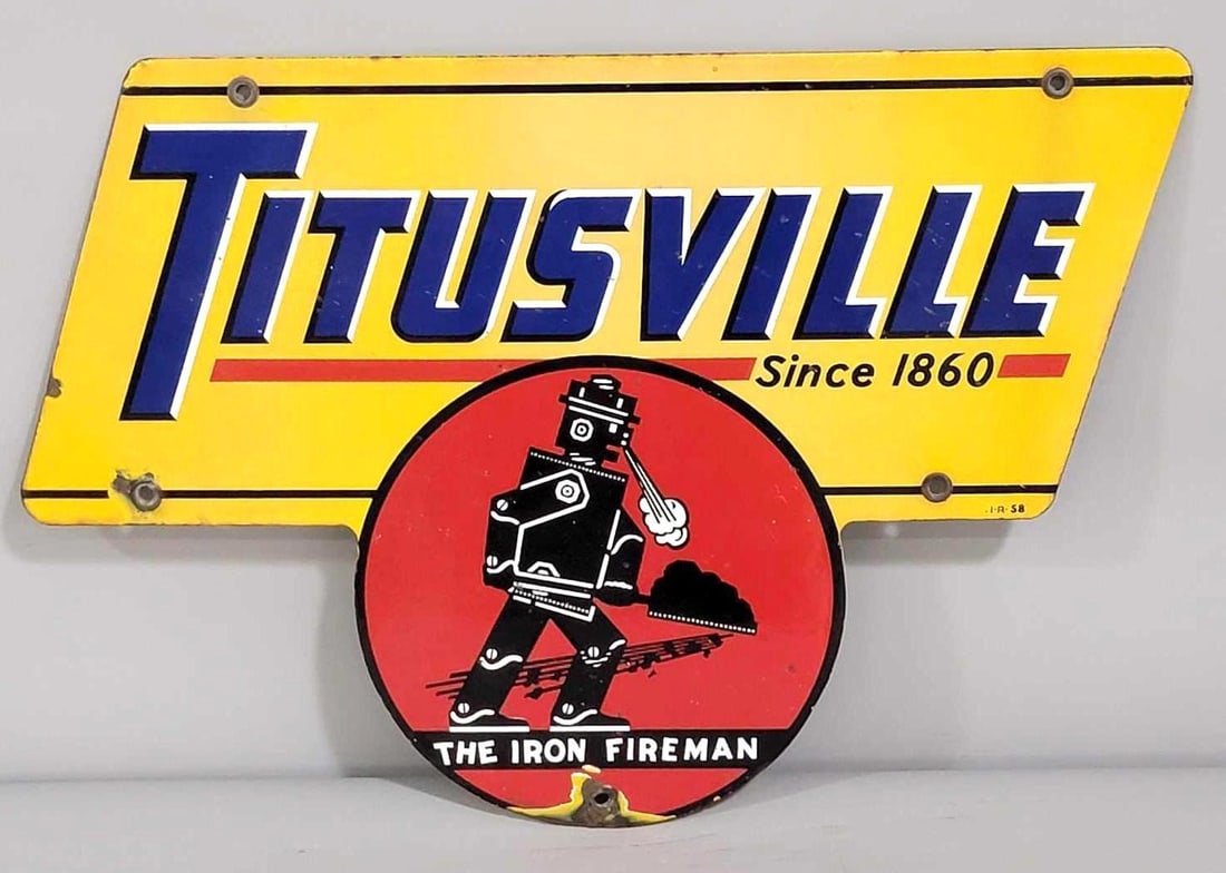 Titusville "The Iron Fireman" Porcelain Sign (TAC) (1 of 5)