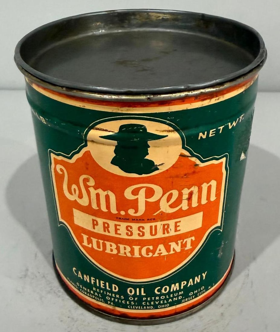 WM Penn Metal Grease Can: rate 8, the one pound metal grease can has excellent color and shine, shows some wear