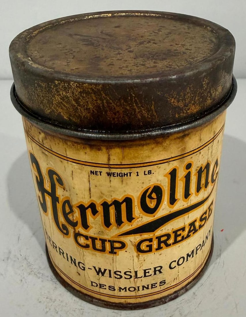 Hermoline Cup Grease Metal Can: rate 7, the one pound metal grease can has good color, but does show soiling and wear from age, is empty 