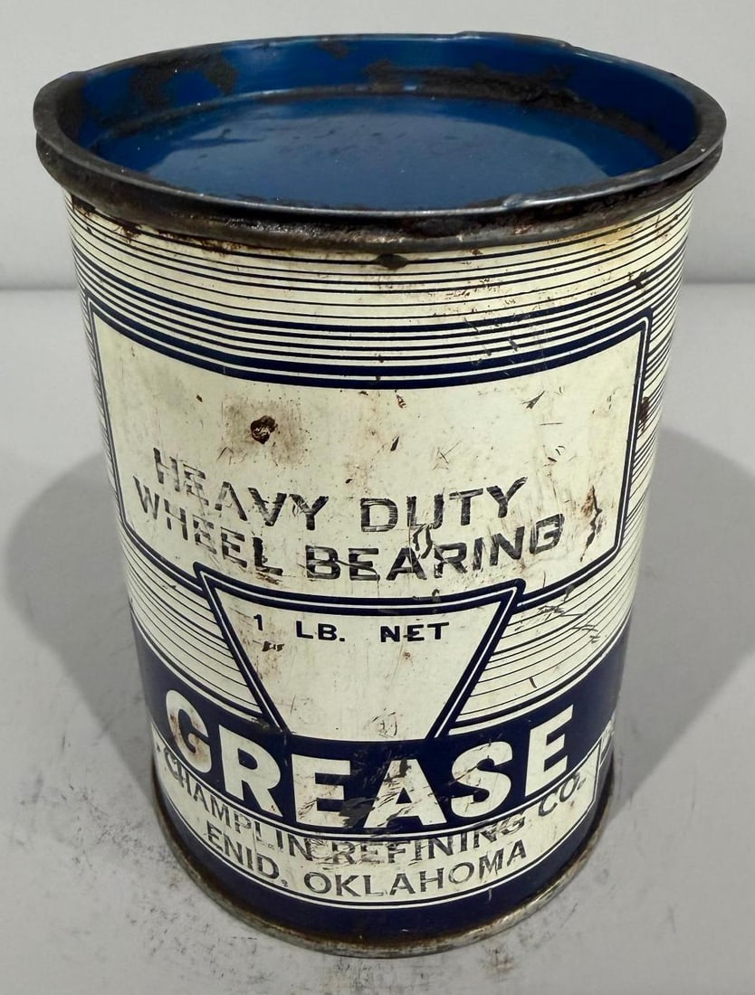 Metal Grease Can w/ Planes Trains & Automobiles: rate 7.5, the one pound metal grease can has good color and shine, has graphics around the bottom edge, shows normal wear from age and use