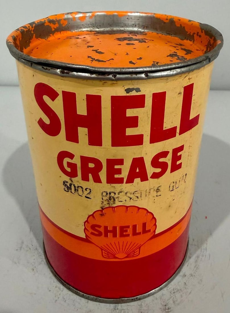 Shell Grease Metal Can: rate 7.5, the one pound metal grease can has good color and shine, shows wear 