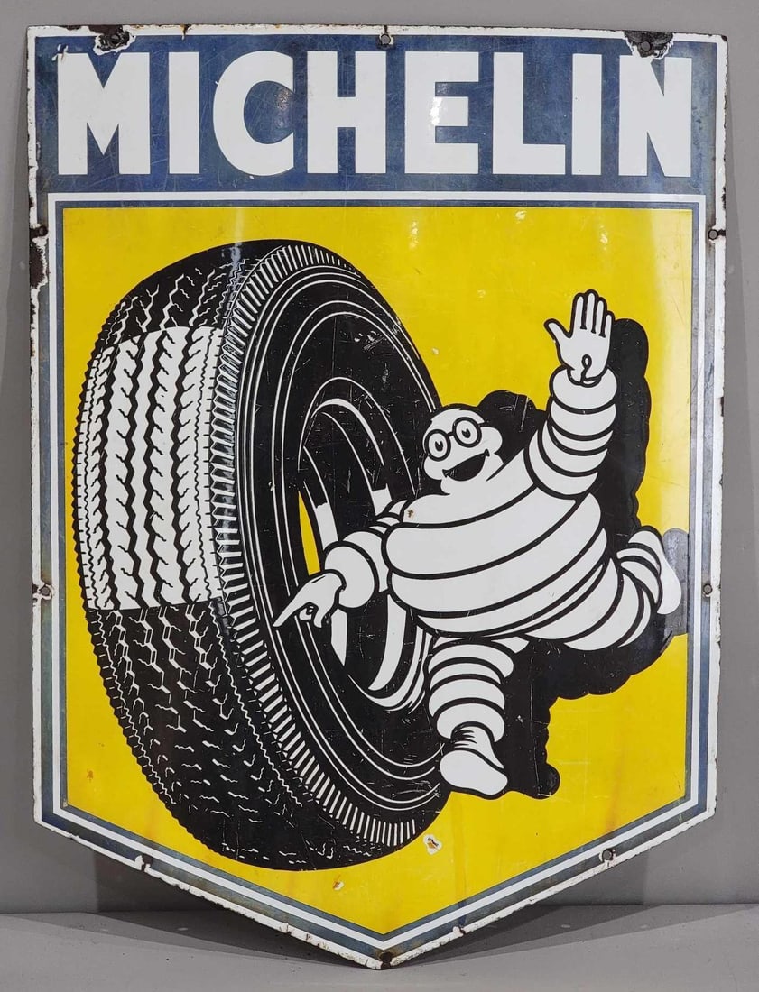 Michelin w/Bibendum & Tire Porcelain Sign (TAC): Rated 7.5, 32"x23", the SSP die-cut sign has wear, scratches and fading. TAC #063269